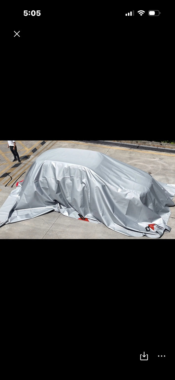Supplier-provided demonstration of EV600800 blanket covering a vehicle