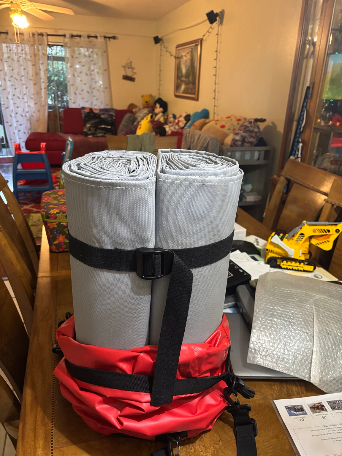 Inspected gray vehicle fire blanket folded in its carrying case